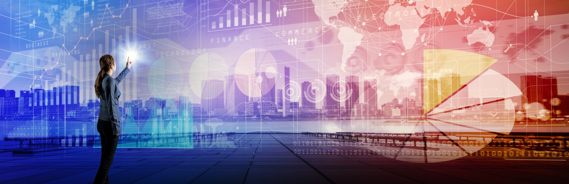 abstract image of a business woman interacting with a large digital overlay screen showing several graphs, bar charts and pie charts with a cityscape visualisation backdrop