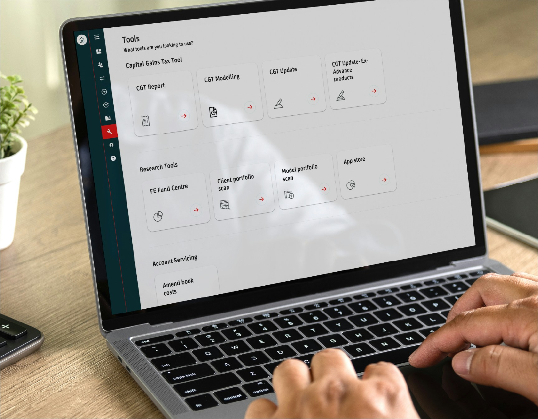 platform-tools-image Hands typing on a laptop showing a screen from the Scottish Widows Platform